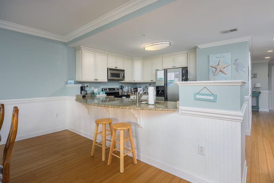 Barstools at kitchen counter.