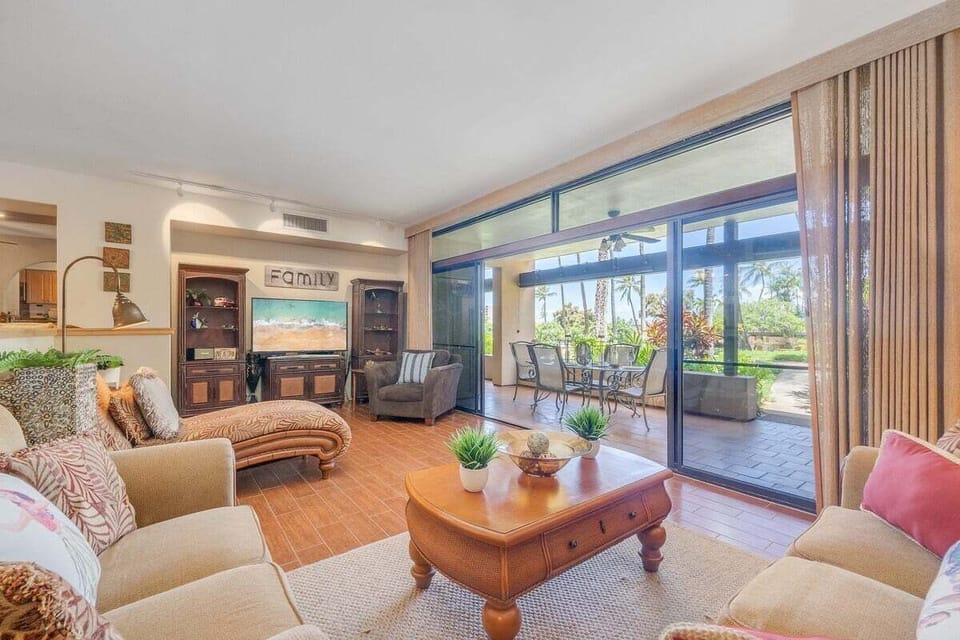 Spacious living room with a comfortable sleeper sofa—perfect for extra guests or cozy lounging