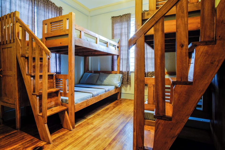 Family Room | Desk, bed sheets