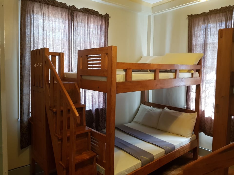 Family Room | Desk, bed sheets