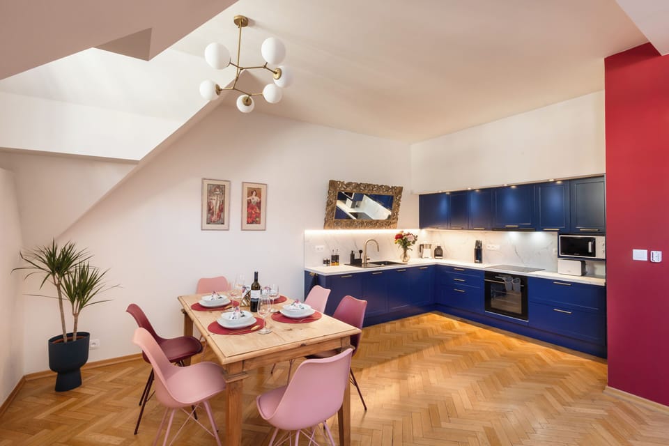 Luxury Apartment, Balcony | Living area | 120-cm flat-screen TV with cable channels, TV, tablet