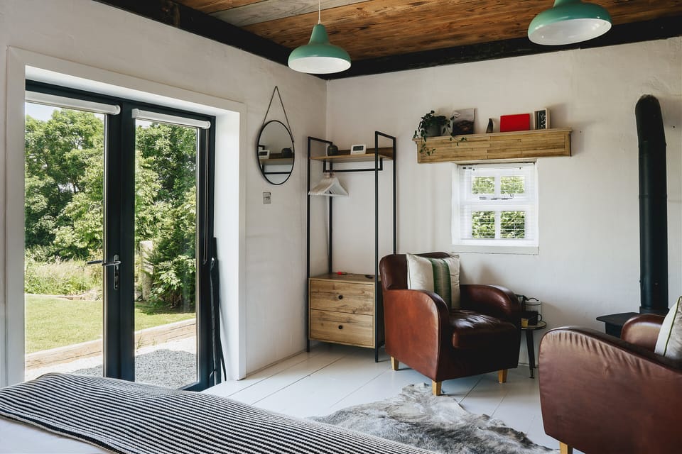 Deluxe Studio, 1 King Bed, Garden View, Garden Area (Kota) | Living area | Flat-screen TV