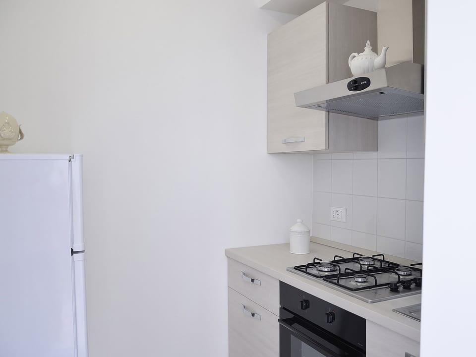 Superior Suite, Balcony | Private kitchen | Full-size fridge, microwave, stovetop, coffee/tea maker