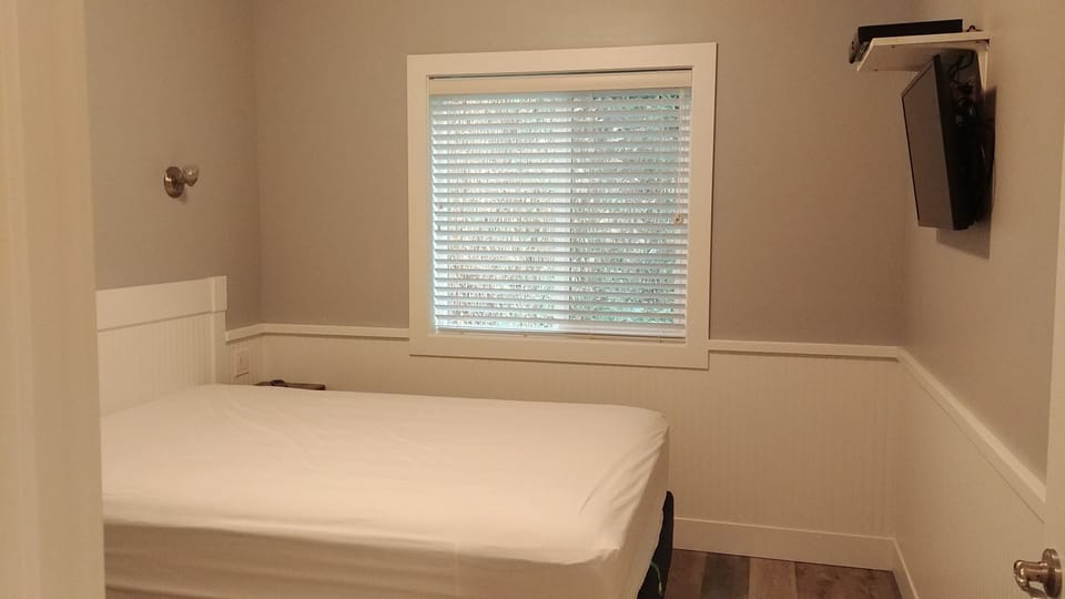 Deluxe Cottage, 1 Queen Bed (Guests Provide Linens) | 1 bedroom, free WiFi