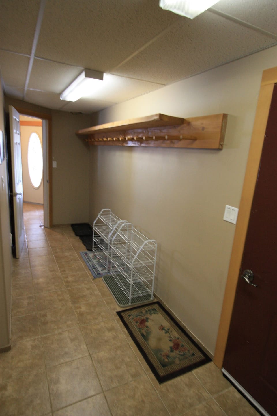 Storage area for coats, hats, mittens, ski boots and shoes.