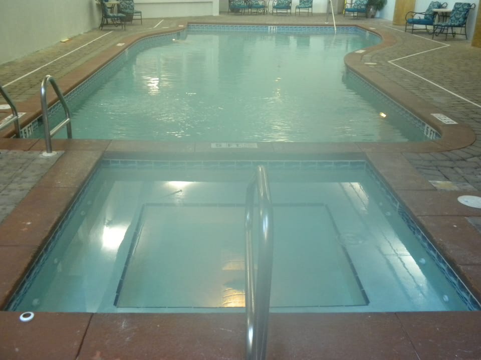 indoor pool with hot tub