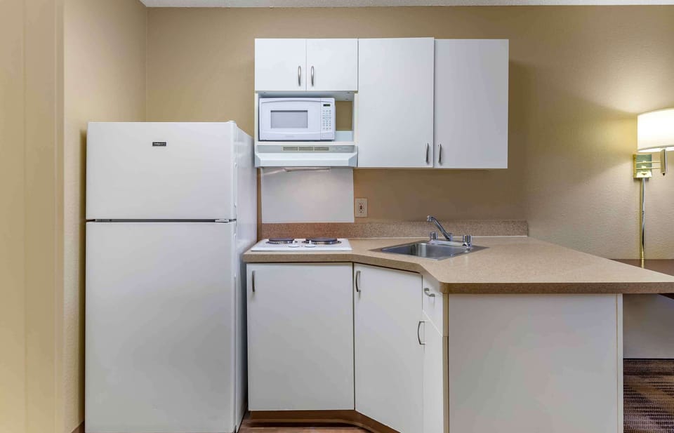 Studio, 1 King Bed, Non Smoking | Private kitchen | Full-size fridge, microwave, stovetop, coffee/tea maker