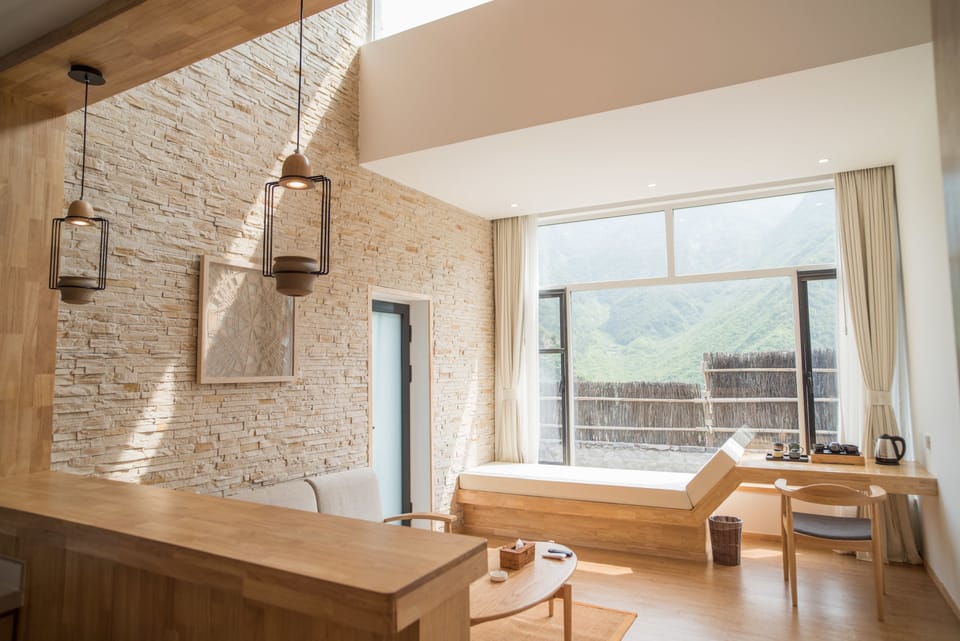 Superior Suite with Courtyard | Living area | TV