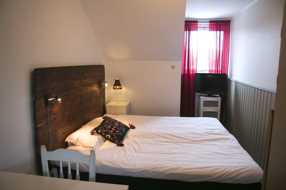 Blackout drapes, iron/ironing board (on request), WiFi (free)