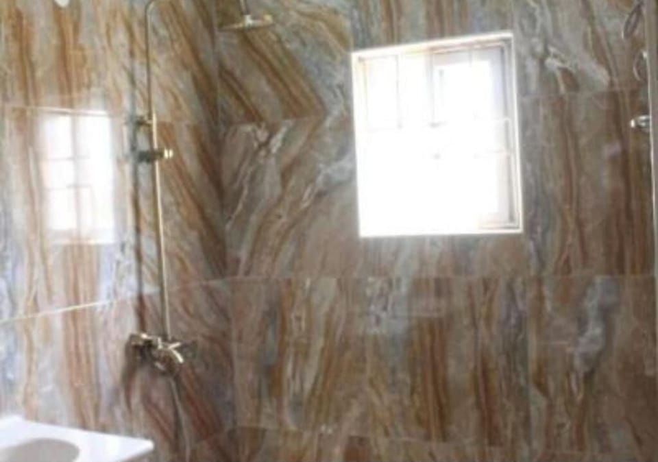 Shower, free toiletries, towels, soap