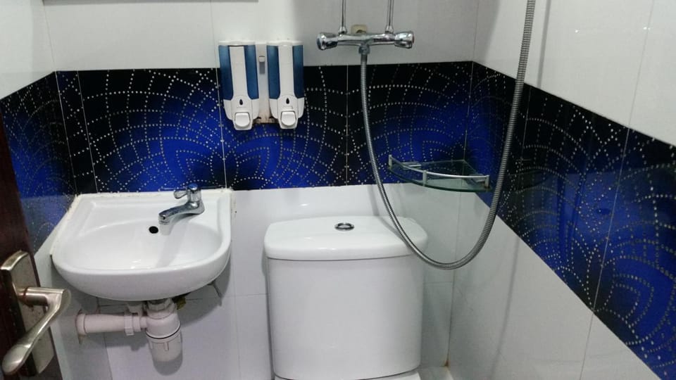Shower, free toiletries, hair dryer, slippers