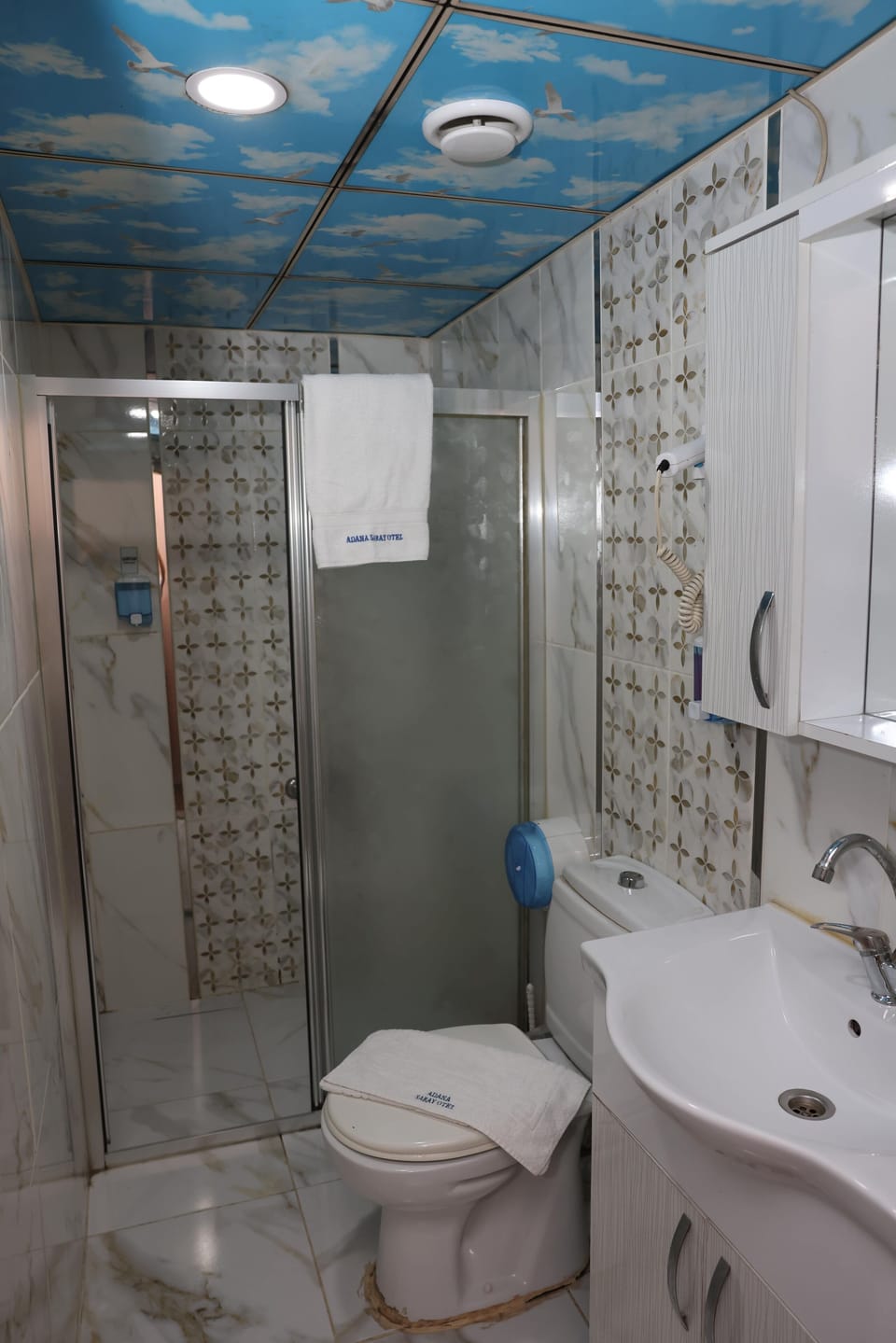 Shower, free toiletries, hair dryer, slippers