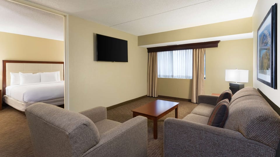 Suite, 1 King Bed, Non Smoking | Premium bedding, down comforters, pillowtop beds, in-room safe