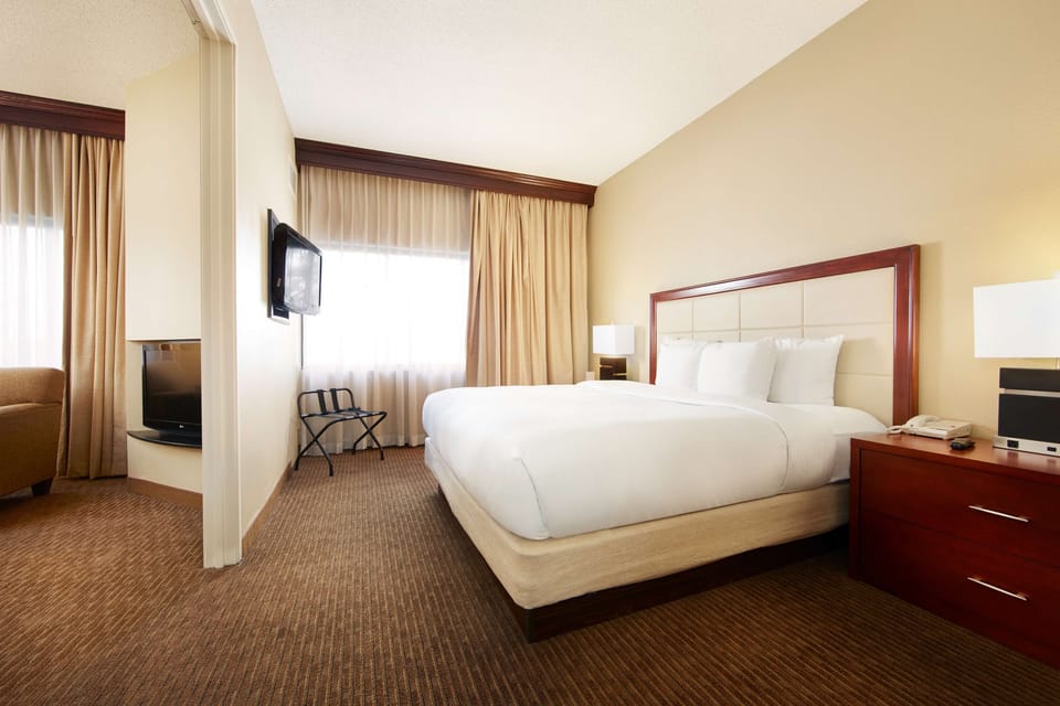 Premium bedding, down comforters, pillowtop beds, in-room safe