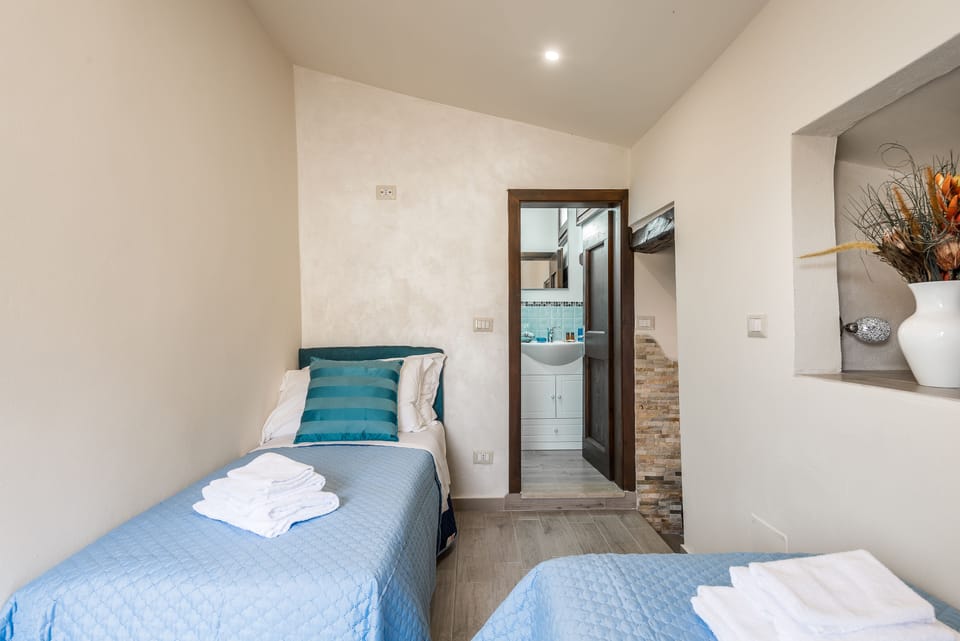 Apartment, 2 Bedrooms | 2 bedrooms, individually furnished, desk, iron/ironing board