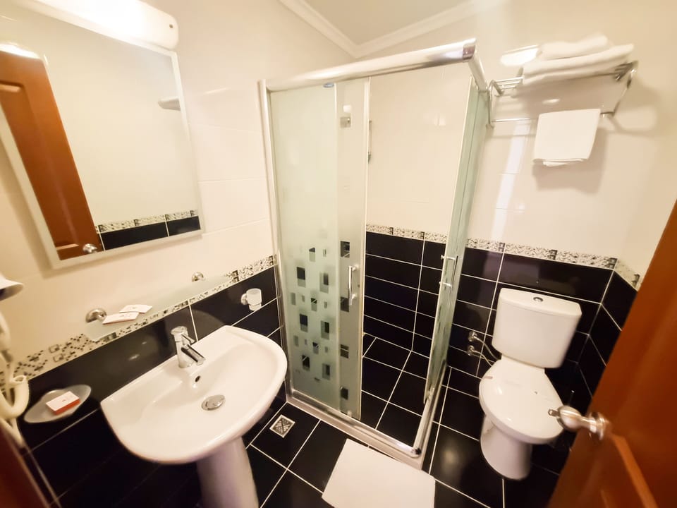 Double Room, Terrace, Sea View | Bathroom | Shower, free toiletries, hair dryer, slippers