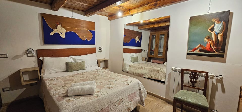 Appartamento Monti, via 4 Cantoni, 9 | Living area | Flat-screen TV