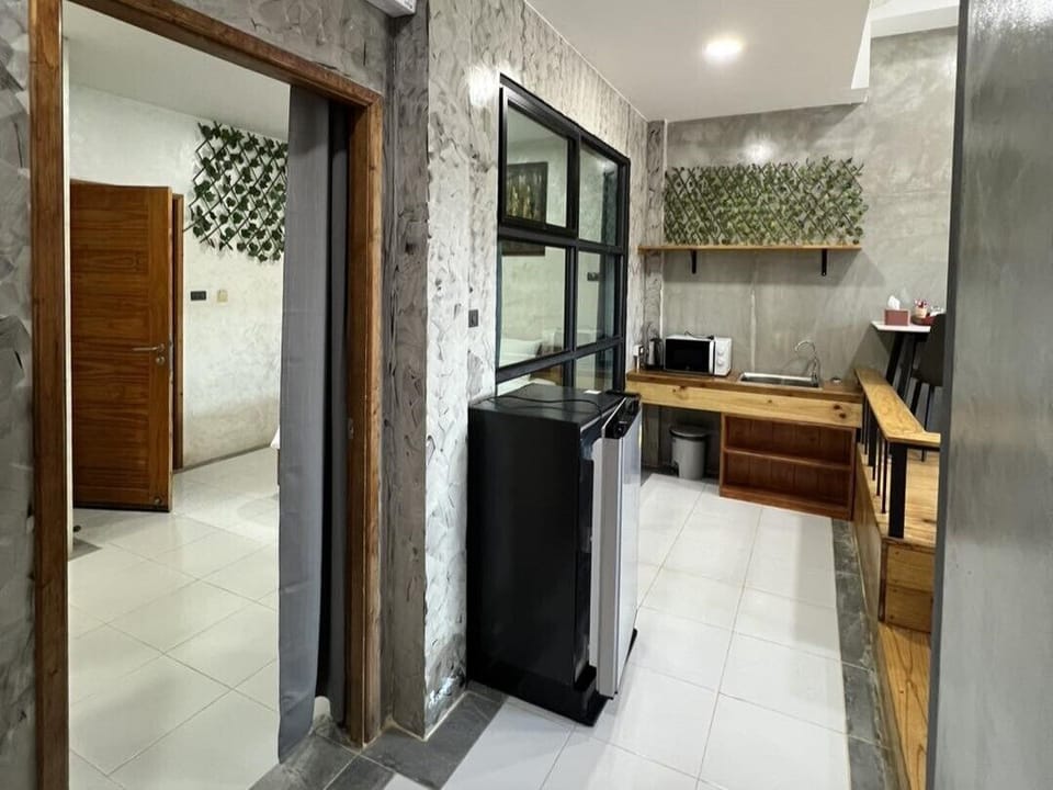 Family Suite | Private kitchen | Fridge, coffee/tea maker, electric kettle