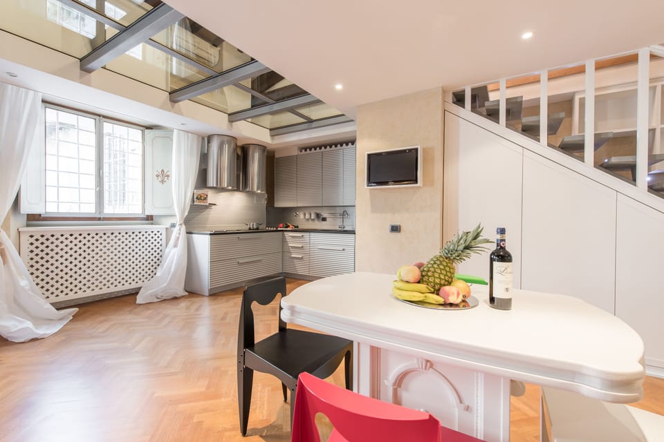 Apartment, 1 Bedroom | Private kitchen | Full-size fridge, stovetop, cookware/dishes/utensils, dining tables