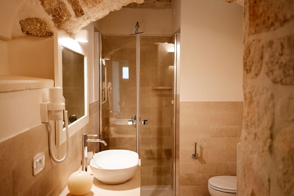 Shower, free toiletries, hair dryer, slippers