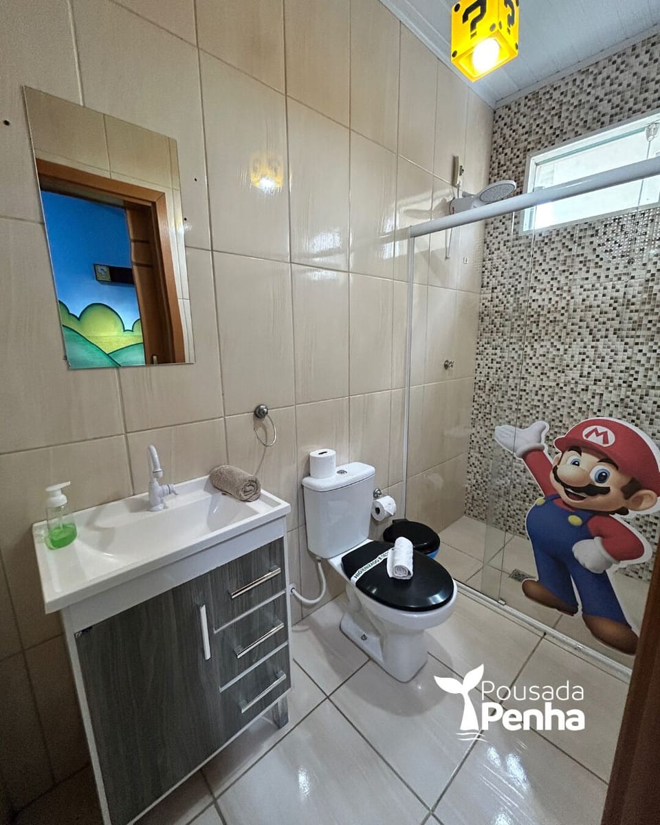 Suite Familia Mario e Luigi | Bathroom | Shower, hair dryer, towels, soap