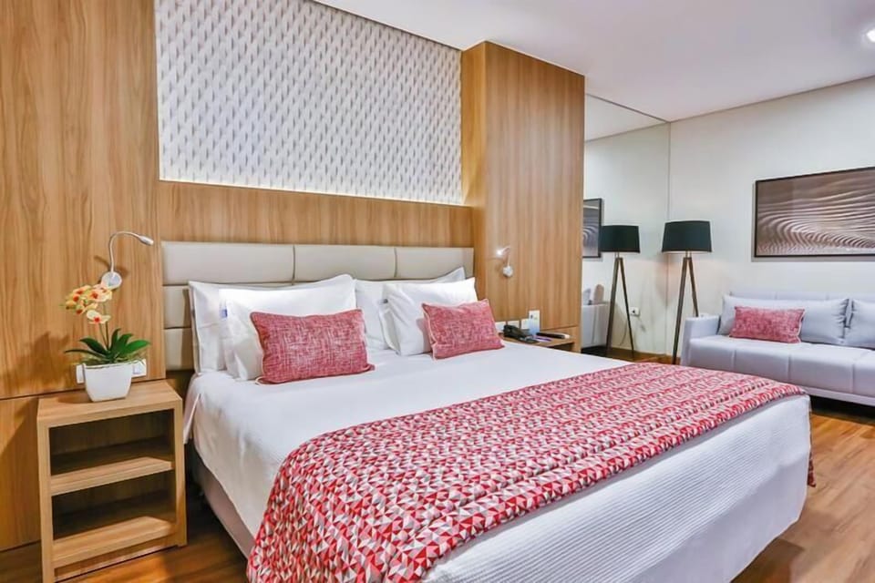 Superior Triple Room | Minibar, in-room safe, desk, laptop workspace