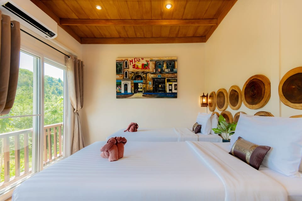 Family Room, 3 Bedrooms, River View | Blackout drapes, soundproofing, WiFi (free), bed sheets