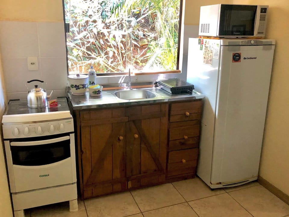 Full-size fridge, microwave, oven, cookware/dishes/utensils
