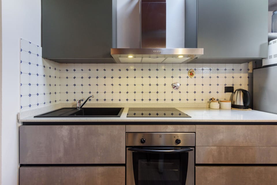 Apartment, 1 Bedroom | Private kitchen | Fridge, microwave, oven, stovetop