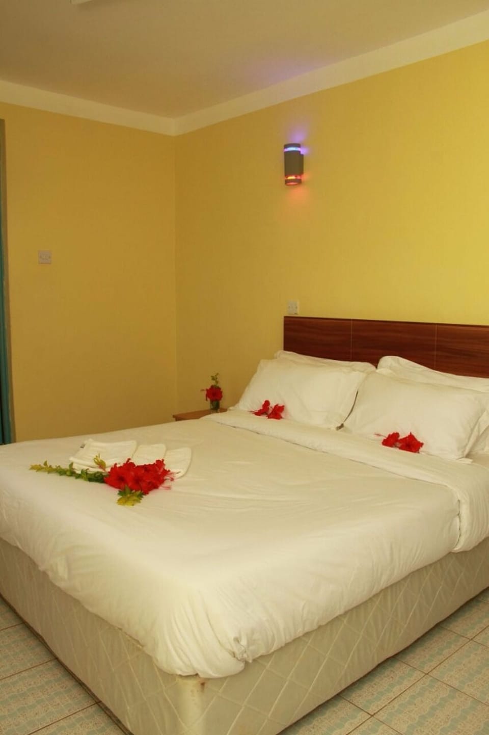 Minibar, desk, bed sheets