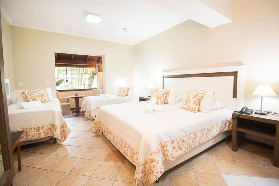 Family Suite | Premium bedding, minibar, blackout drapes, free WiFi