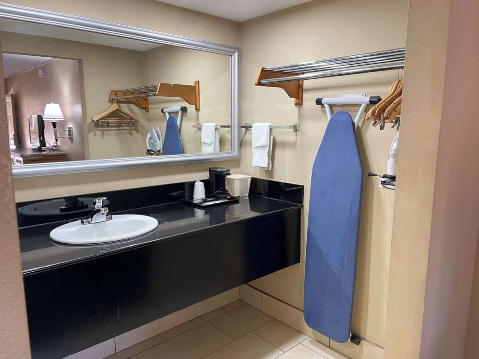 Combined shower/tub, hair dryer, towels, soap