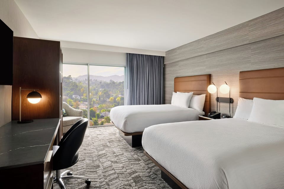 Premium bedding, pillowtop beds, in-room safe, desk