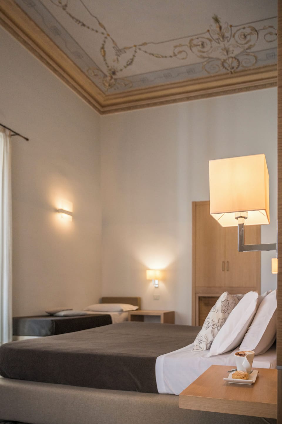 Superior Triple Room | Minibar, in-room safe, individually decorated, individually furnished