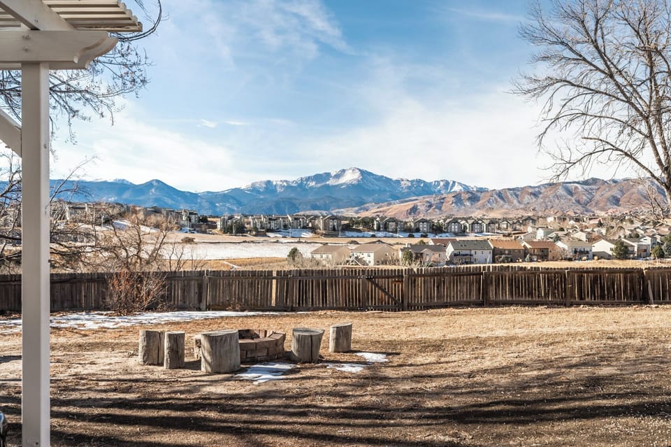 An older photo that captures the view. The fire pit now has Adirondack chairs.