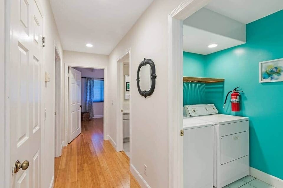 Washer/Dryer-Detergent provided. Linen closet with iron and streamer. 