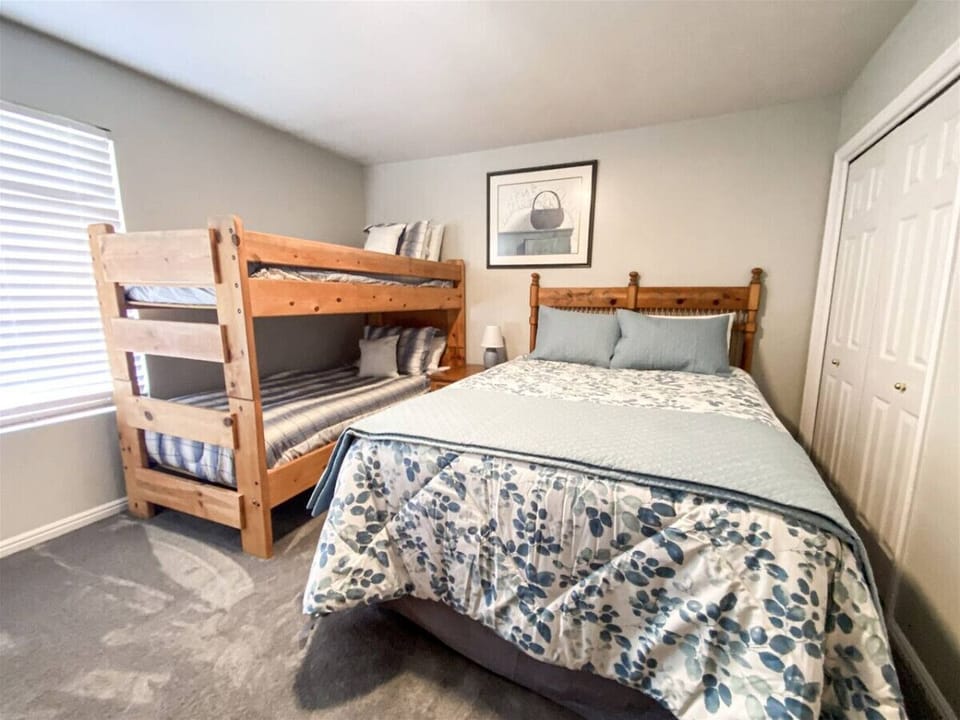 Bedroom 2 One Queen bed Twin Bunks