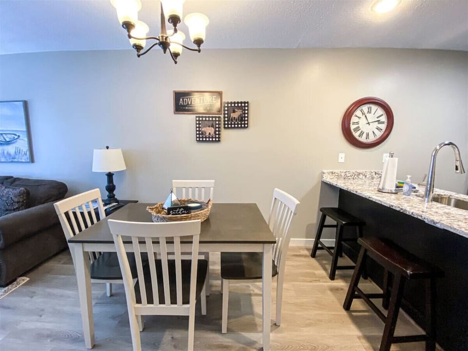 Cozy dining table with nearby living room seating