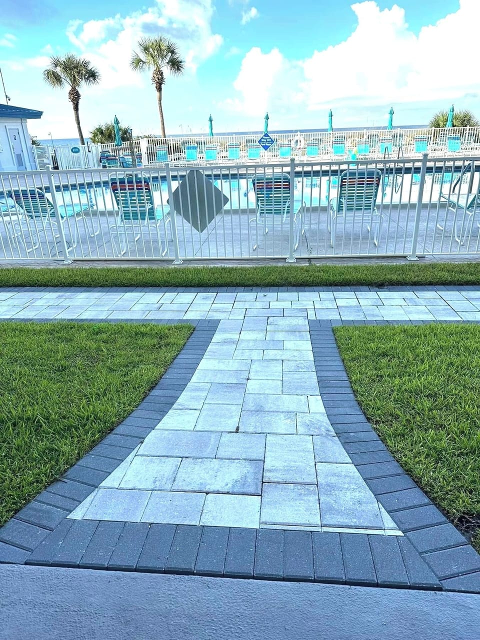 BEAUTIFUL BRAND NEW PAVERS LEADING FROM OUR BALCONY TO THE POOL AND HOT TUB!
