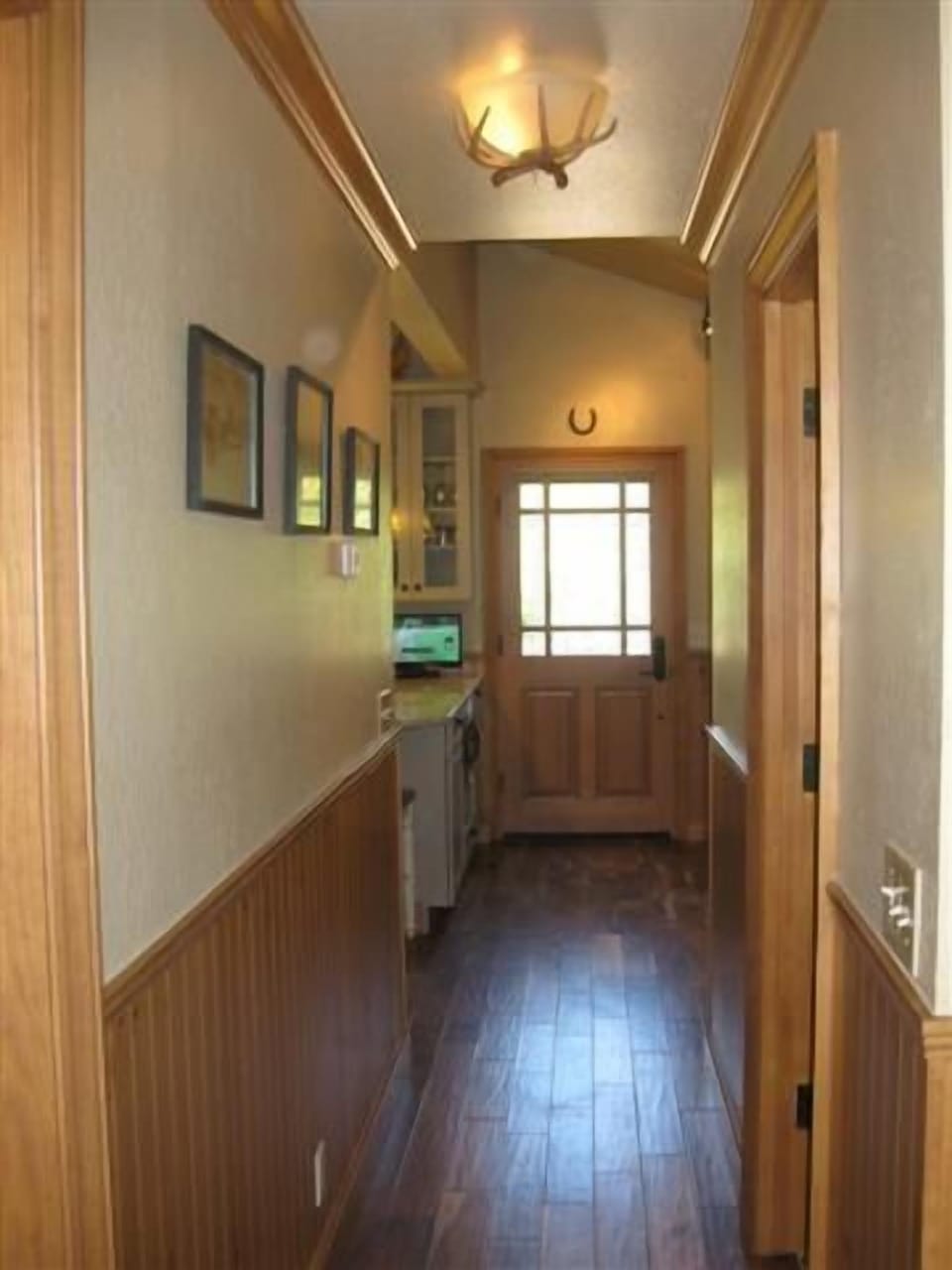 Hallway leading to Bedroom, Bath & Backyard.