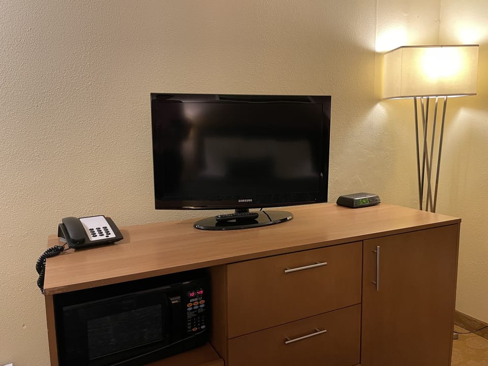 Individually furnished, desk, laptop workspace, blackout drapes