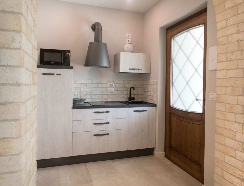 Deluxe Apartment, 1 Bedroom, Kitchen, Garden View (Uriel) | Private kitchen | Fridge, paper towels