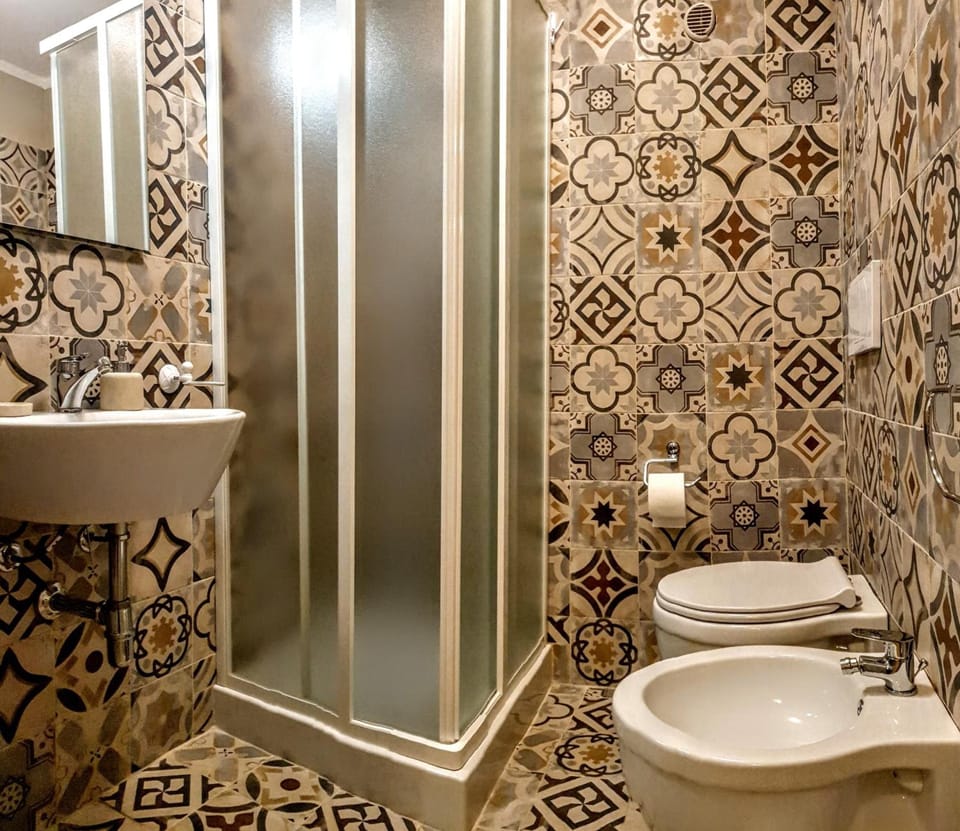 Family Quadruple Room, Mountain View | Bathroom | Shower, free toiletries, bidet, towels