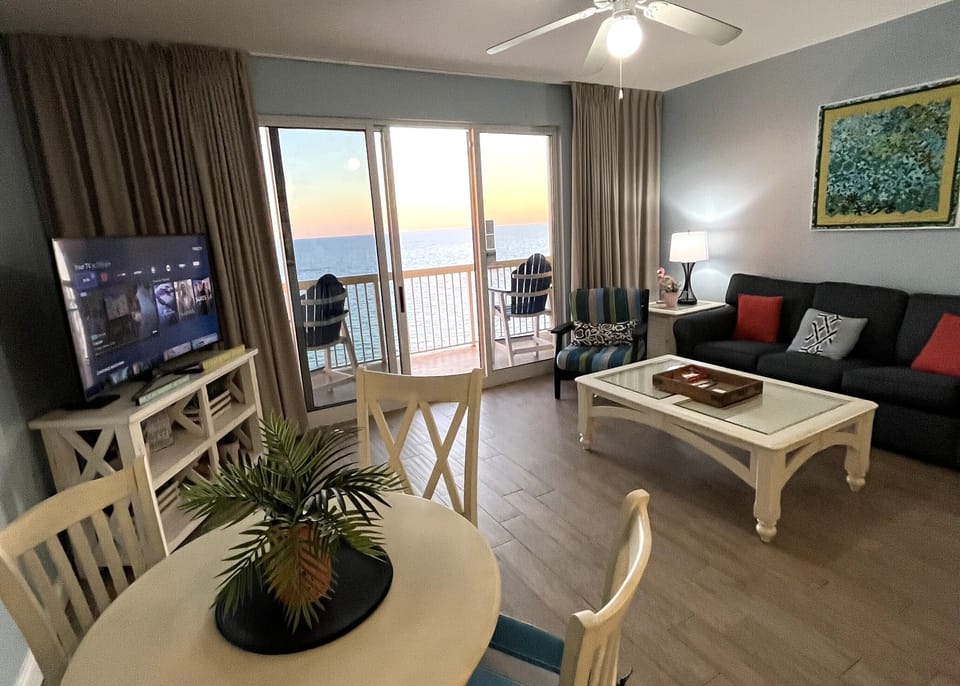 right, open-concept living space that seamlessly frames the beautiful Gulf views.