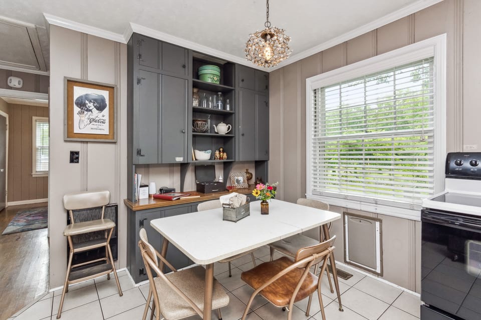 Dining area. Set with 4 chairs, additional in back BR closet.