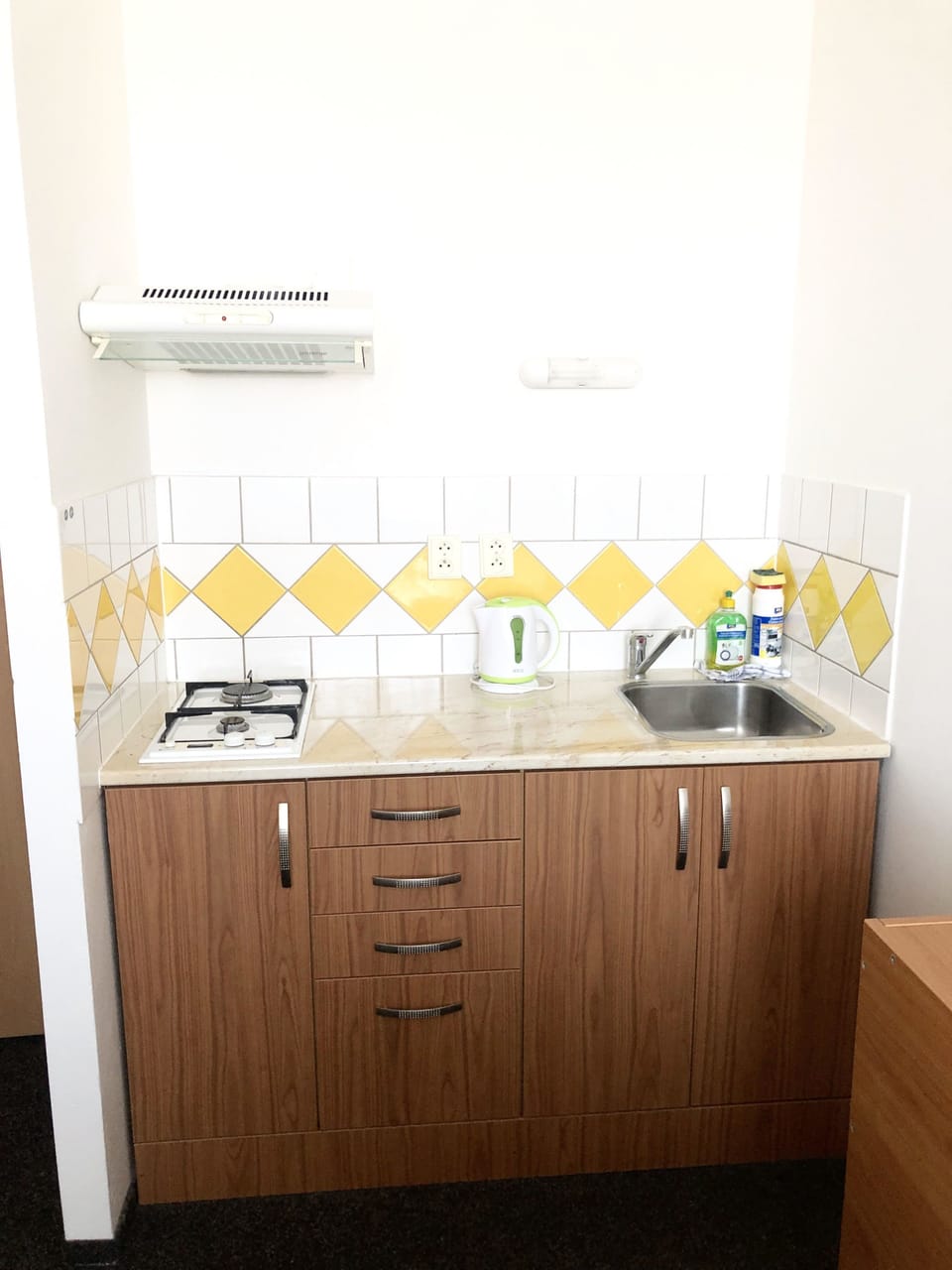 Fridge, microwave, stovetop, coffee/tea maker