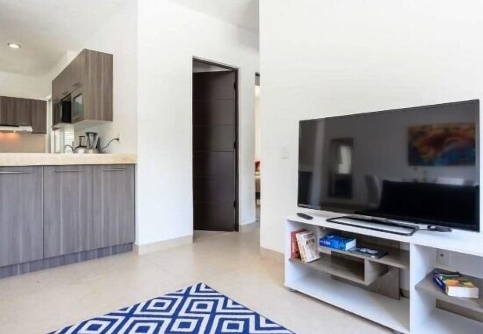 Family Condo, 2 Bedrooms | Living area | Flat-screen TV
