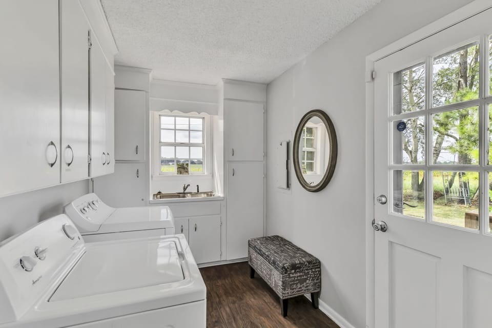 The Laundry Room - with ironing board and sink.  Detergent & dryer sheets incl.