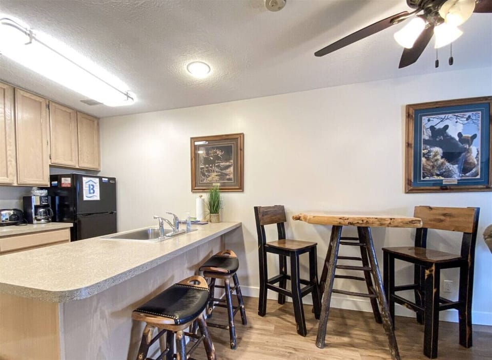 Rustic kitchen and dining area with cozy seating, perfect for casual meals and conversation.