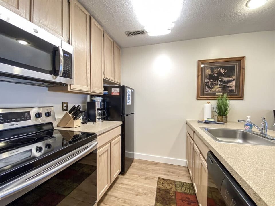 Cozy kitchen space with modern appliances—ideal for whipping up meals and making memories.
